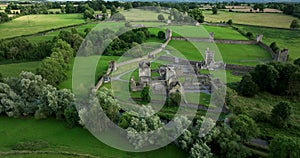 An ancient castle set against a backdrop of green dales in Ireland Kells Priory