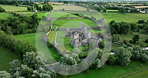 An ancient castle set against a backdrop of green dales in Ireland Kells Priory