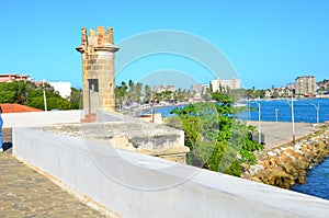 Ancient castle tower with sea view photo