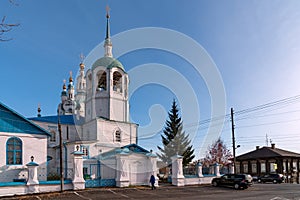 Ancient Cathedral of the Assumption of the Blessed Virgin Mary 1793 with a car near the fence in the city of Yeniseisk on an