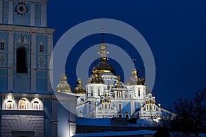 Ancient Catherine`s Church - Kiev Patriarchate Orthodox Church illuminated by lights at night. Architectural monument of