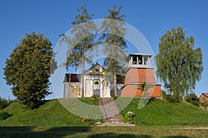 Ancient catholic church of Our Lady of Perpetual Help and  belfry in Shemetovo village, Minsk region, Belarus