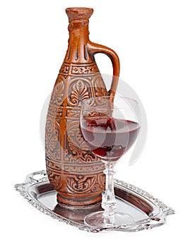 Ancient ceramic bottle with Georgians wine photo
