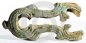 Ancient chape of a sword scabbard isolated on a white background