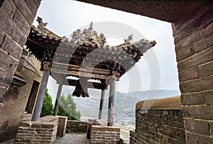 The ancient Chinese bell tower outside the gate.