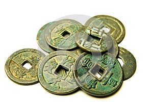 Ancient Chinese bronze coins on white background