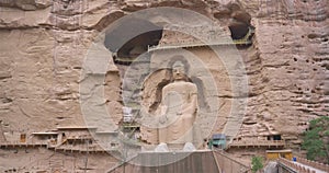 Ancient Chinese Buddha Statue at Bingling Cave Temple in Gansu China. UNESCO World heritage site