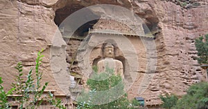 Ancient Chinese Buddha Statue at Bingling Cave Temple in Gansu China. UNESCO World heritage site