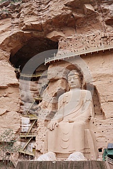 Ancient Chinese Buddha Statue at Bingling Cave Temple in Lanzhou Gansu China. UNESCO World heritage site