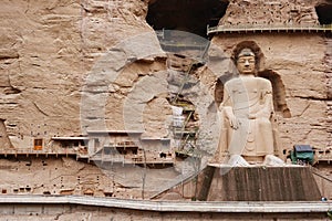 Ancient Chinese Buddha Statue at Bingling Cave Temple in Lanzhou Gansu China. UNESCO World heritage site