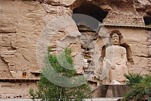 Ancient Chinese Buddha Statue at Bingling Cave Temple in Lanzhou Gansu China. UNESCO World heritage site