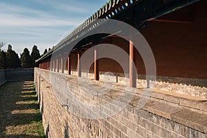 Ancient Chinese building city brick wall with red walls and pillars, in the Temple of Heaven in Beijing, China