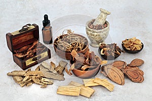 Ancient Chinese Medication with Plant Based Herbs and Spice photo