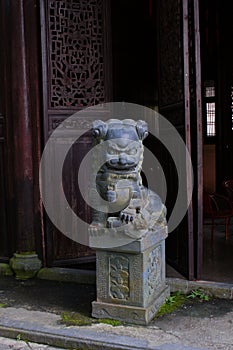 Ancient Chinese stone lion sculpture is a traditional art