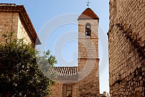 ancient church with bell tower at old european town,