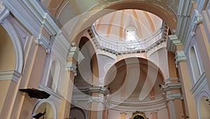 Ancient church dome with railing and bright windows