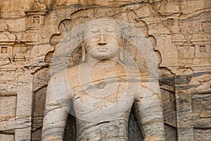 Ancient City of Polonnaruwa. Photo of seated Buddha in meditation at Gal Vihara Rock Temple & x28;Gal Viharaya& x29;. Sri Lanka