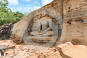 Ancient City of Polonnaruwa. Photo of seated Buddha in meditation at Gal Vihara Rock Temple (Gal Viharaya). Sri Lanka