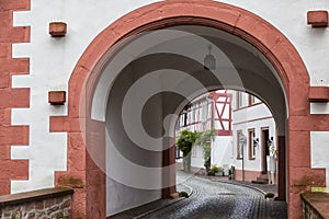 Ancient city Selingenstadt, Germany, historical old town, entrance gate in the wall