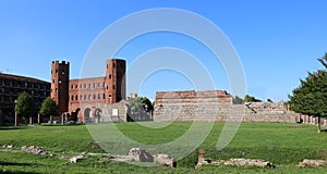 Ancient city wall of red stones of Turin