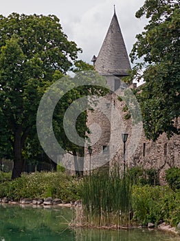 Ancient city wall and tower with ditch in Andernach, Germany