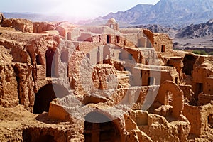 Ancient clay architecture in the abandoned village of Kharanagh. Persia. Iran. Sights Yazd. photo