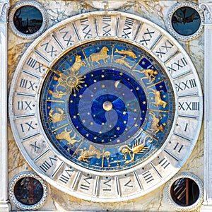 Ancient clock Torre dell`Orologio with Zodiac signs, Venice, Italy. It is old landmark of Venice