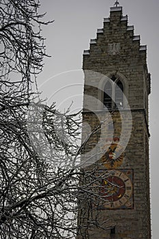 ancient clock tower in vipiteno old town photo