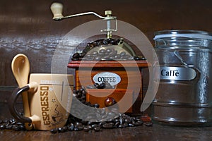 Ancient coffee grinder and coffee beans