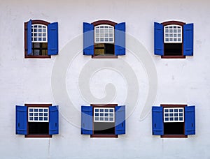 Ancient colonial windows in Serro, Minas Gerais, Brazil photo