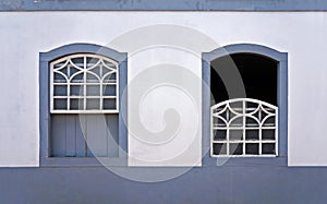 Ancient colonial windows in Serro, Minas Gerais, Brazil photo