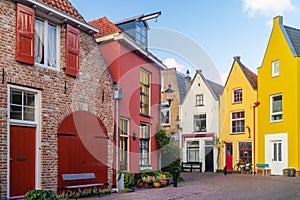 Ancient colorful houses in the famous Dutch Walstraat street in Deventer photo