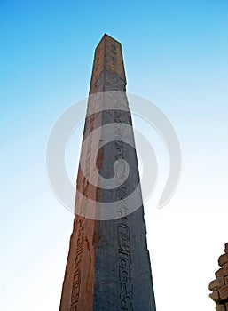 Ancient column, obelisk and pillar in Temple of Karnak. Egypt