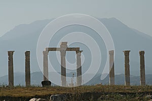 Ancient columns against mountain