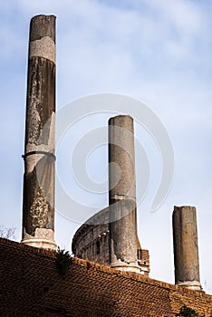 Ancient columns of the Sacred Way in front of the Colosseum in Rome