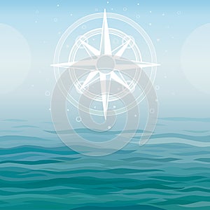 Ancient compass on a sea background