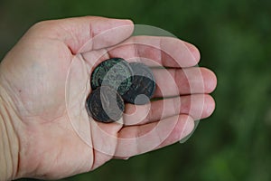 Ancient copper coins of Byzantium in hand