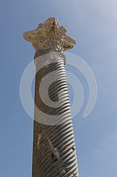 Ancient Corinthian Column Skyward. Close-up of a Corinthian column at the Kourion archaeological site, Cyprus
