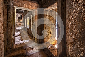 Ancient corridor in Bayon Temple, Cambodia photo