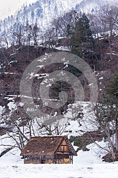 Ancient cottage in snow season