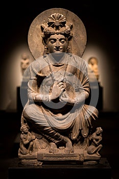 Ancient cross-legged Bodhisattva schist statue image in 2nd century, Kushan dynasty from Gandhara, Pakistan