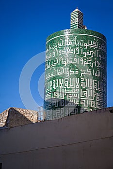 Ancient cylindrical shaped minaret photo