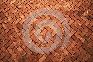 Ancient dark orange red tone brick floor pavement stones