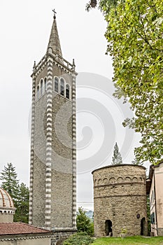 The ancient Delubro and the bell tower of the parish church, in the historic center of Lizzano in Belvedere, Italy photo