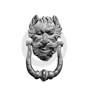 Ancient door knocker isolated on white background.