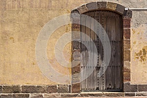 Ancient door and wall in the Plaza de Francia Old Town Panama City Panama photo