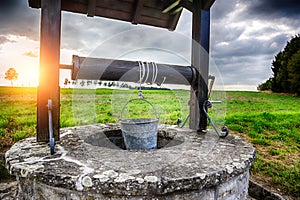 Ancient draw-well in European village