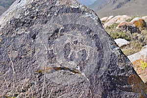 Ancient drawings on mountain rocks