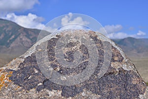 Ancient drawings on mountain rocks