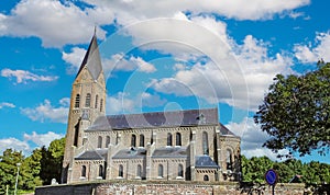 Ancient dutch church in rural village in summer - Linne (St. Martinus Kerk), Limburg, Netherlands